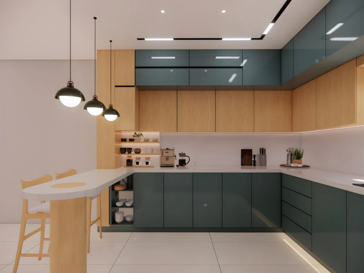 Area meja bar sarapan (breakfast bar) di dapur nuansa deep cyan dengan lampu gantung industri dan lantai keramik putih bersih.