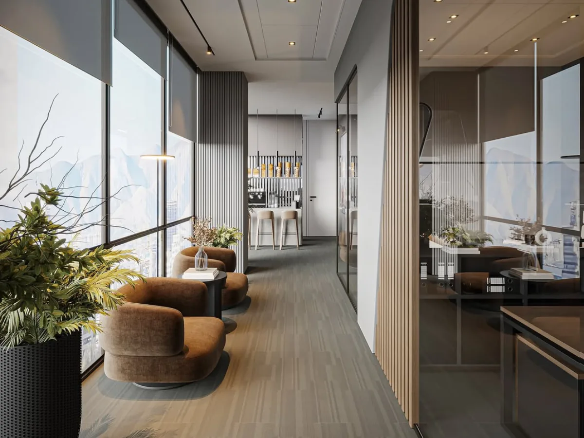 Desain home office minimalis modern dengan dinding kaca, kursi lounge cokelat, tanaman hias, dan pencahayaan alami dari jendela besar.