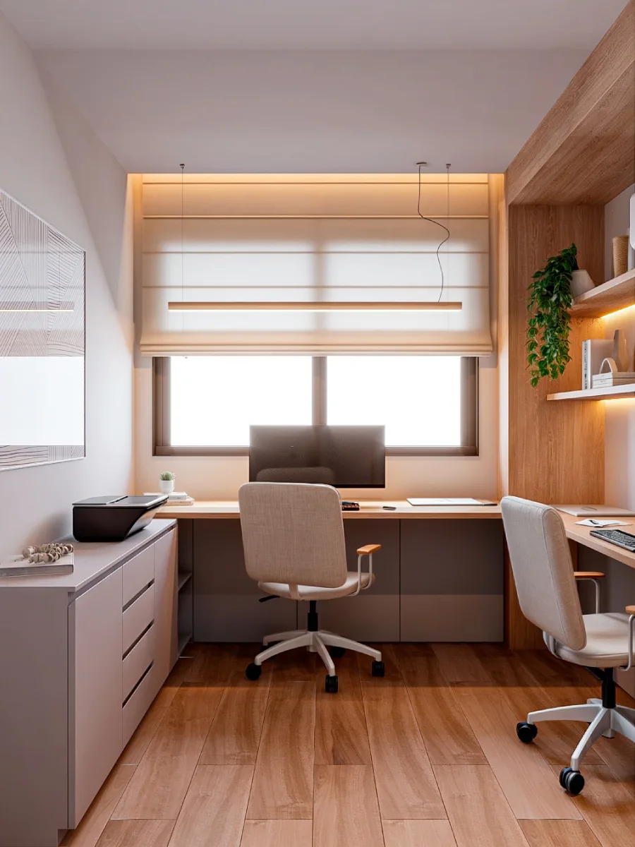 Desain home office minimalis menghadap jendela dengan meja kayu memanjang, kursi kerja krem, dan kabinet penyimpanan rendah berwarna netral.