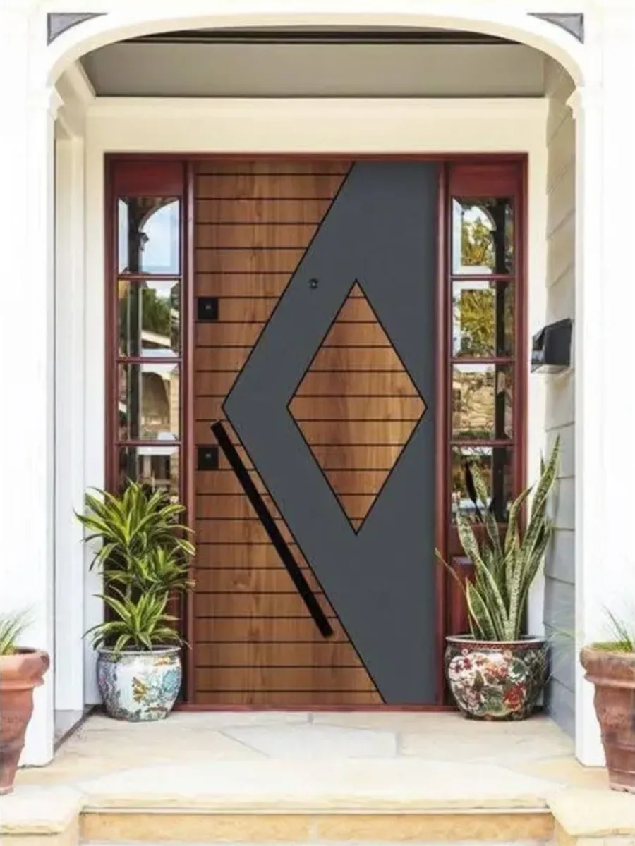 Pintu kayu modern dengan overlay bentuk wajik (diamond) warna abu-abu tua dan handle miring.