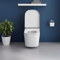 Toilet duduk modern berwarna putih di kamar mandi bersih dengan dinding biru, rak handuk minimalis, dan tanaman hias di sudut ruangan